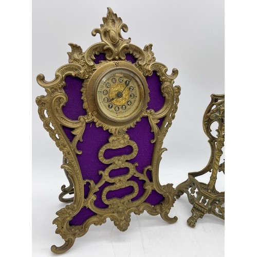 436 - GILT METAL ROCOCO FRAMED EASEL BACK TIME PIECE AND A CHERUB ROCOCO FRAMED DRUM TIME PIECE