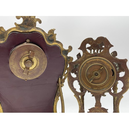 436 - GILT METAL ROCOCO FRAMED EASEL BACK TIME PIECE AND A CHERUB ROCOCO FRAMED DRUM TIME PIECE