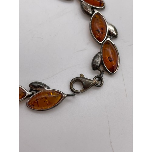 565 - BOXED SILVER AMBER LINK BRACELET