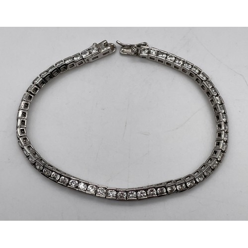 566 - 925 SILVER AND CZ TENNIS BRACELET