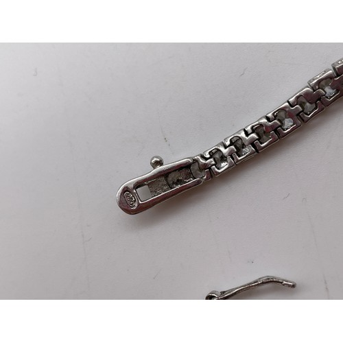 566 - 925 SILVER AND CZ TENNIS BRACELET