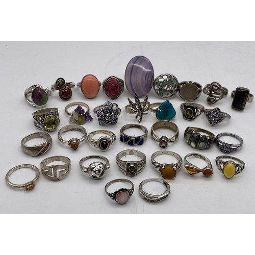 573 - BAG OF SILVER AND WHITE METAL DRESS RINGS VARIOUS STYLES INC SOME INSET WITH SEMI PRECIOUS STONES AN... 