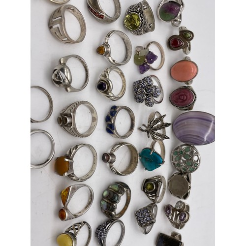 573 - BAG OF SILVER AND WHITE METAL DRESS RINGS VARIOUS STYLES INC SOME INSET WITH SEMI PRECIOUS STONES AN... 