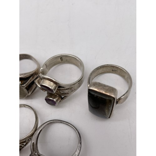 573 - BAG OF SILVER AND WHITE METAL DRESS RINGS VARIOUS STYLES INC SOME INSET WITH SEMI PRECIOUS STONES AN... 