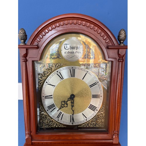 142A - FLAME MAHOGANY ARCH CASED REPRODUCTION LONG CASE CLOCK WITH BRASS DIAL SIGNED THORPE