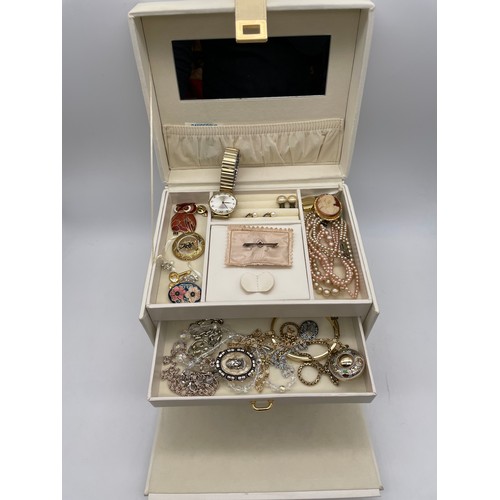 535 - CREAM COLOURED JEWELLERY BOX CONTAINING VARIOUS DRESS JEWELLERY, CLIP ON EARRINGS, FACET BEAD NECKLA... 