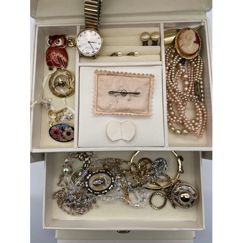 535 - CREAM COLOURED JEWELLERY BOX CONTAINING VARIOUS DRESS JEWELLERY, CLIP ON EARRINGS, FACET BEAD NECKLA... 