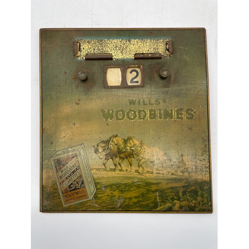 460 - WILLS WOODBINES ENAMEL ADVERTISING CALENDER PLAQUE