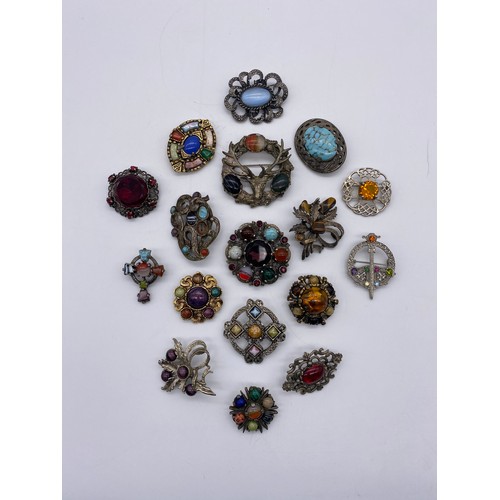 592 - SELECTION OF CELTIC STYLE STONE SET COSTUME JEWELLERY BROOCHES