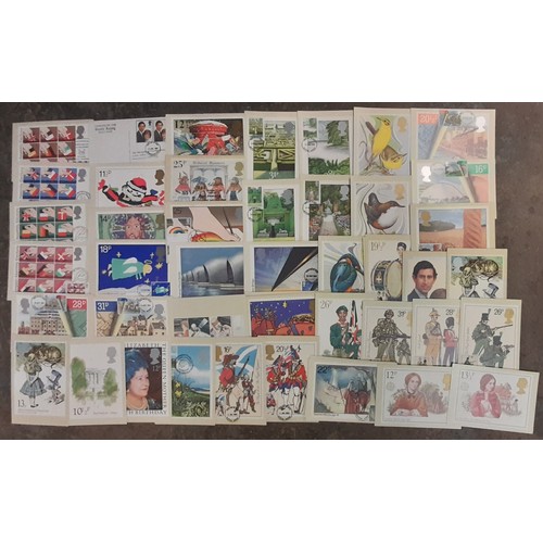 553 - BOX OF GB POSTAGE FIRST DAY COVERS AND POST OFFICE PICTURE CARD SERIES