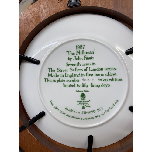 478 - EIGHT WEDGWOOD BONE CHINA STREET SELLERS OF LONDON SERIES PLATES IN WOODEN ROUNDELS WITH CERTIFICATE... 