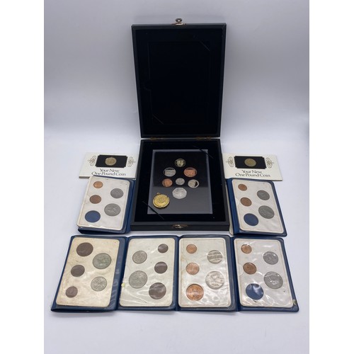 575 - GB DECIMAL PROOF COIN SET, SIX BOOKLETS OF BRITAINS FIRST DECIMAL COINS AND TWO NEW £1 COINS