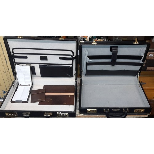 543 - ONE COMBINATION LO0CK BRIEF CASE AND ONE KEY LOCK BRIEFCASE