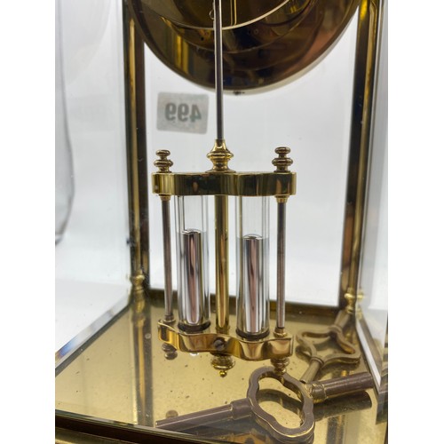 499 - GILT METAL CASED FRENCH FOUR PANE CLOCK WITH DOUBLE WEIGHT MOVEMENT AND KEYS