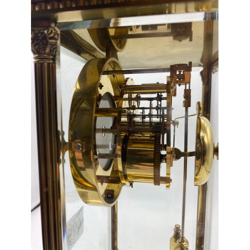 499 - GILT METAL CASED FRENCH FOUR PANE CLOCK WITH DOUBLE WEIGHT MOVEMENT AND KEYS