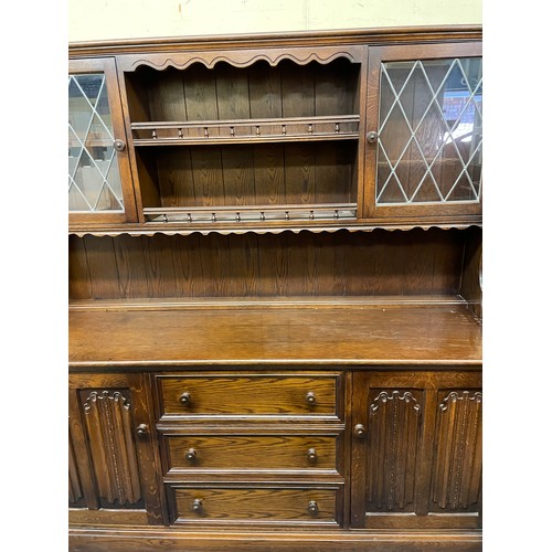 21 - OAK LINEN FOLD LEAD GLAZED DRESSER