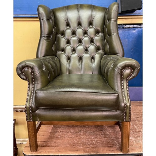 38 - BOTTLE GREEN BUTTON BACK LEATHER WING ARMCHAIR