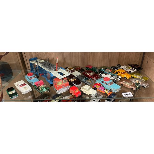 404 - SHELF OF DIE CAST TOY CARS AND TRANSPORTER ALL PLAYWORN
