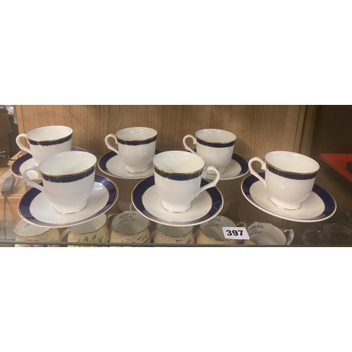 397 - SET OF SIX BEAU MAUNDE BLUE AND GILT LINED TEACUPS