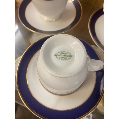 397 - SET OF SIX BEAU MAUNDE BLUE AND GILT LINED TEACUPS
