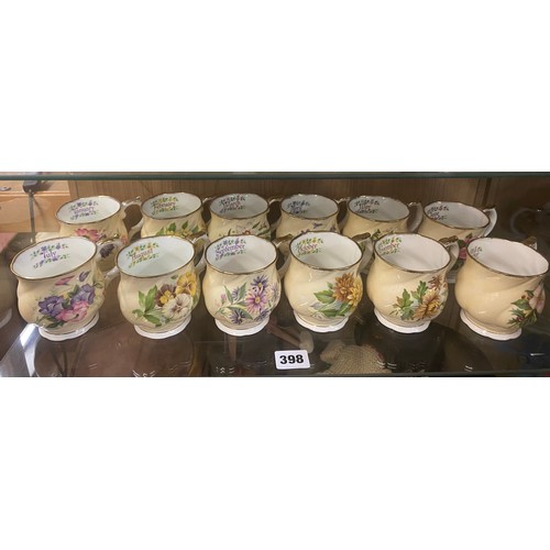 398 - COMPLETE SET OF QUEENS CHINA FLORAL MONTH TEACUPS