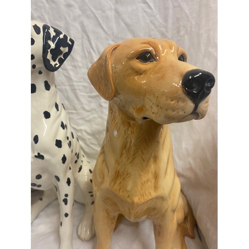 393 - THREE BESWICK RESIN DOG FIGURES - DALMATION, GOLDEN RETRIEVER, AND ST BERNARDS(AF)