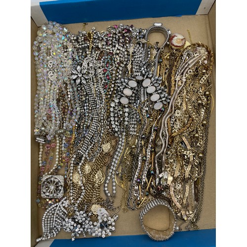 513 - TWO TRAYS OF COSTUME JEWELLERY CHAINS AND DIAMANTE NECKLACES