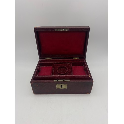 459 - RED MORROCAN LEATHER JEWELLERY BOX CONTAINING VARIOUS FLORAL ENCRUSTED AND ENAMEL BROOCHES