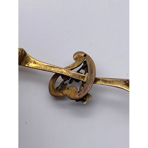 580 - 9CT GOLD ROSE GOLD BAR BROOCH AND POSSIBLY A 18CT GOLD RING STONES MISSING 3G APPROX