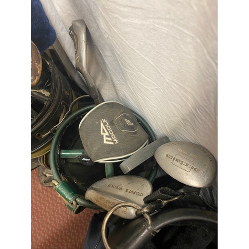 350 - FOUR GOLF BAGS CONTAINING VARIOUS GOLF DRIVERS AND CLUBS