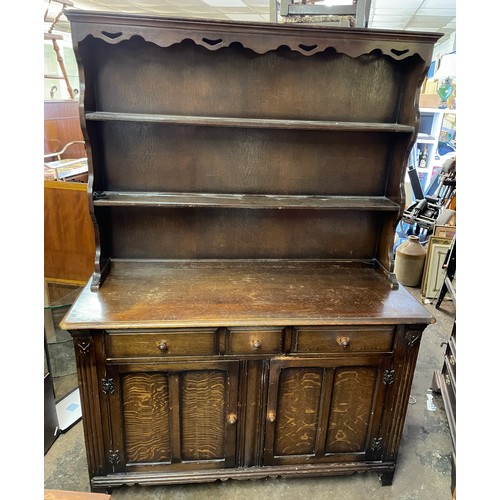 1B - OAK PANELLED CUPBOARD DRESSER WITH PLATE RACK