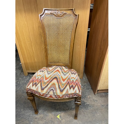 107 - COLONIAL WALNUT AND BERGERE CANED DINING TABLE AND CHAIRS