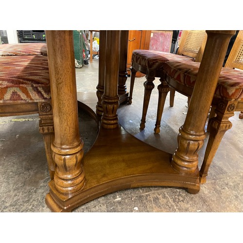 107 - COLONIAL WALNUT AND BERGERE CANED DINING TABLE AND CHAIRS