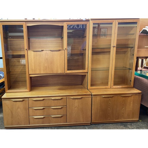 121 - SAKOL TEAK GLAZED LOUNGE UNIT AND ONE SIMILAR UNIT