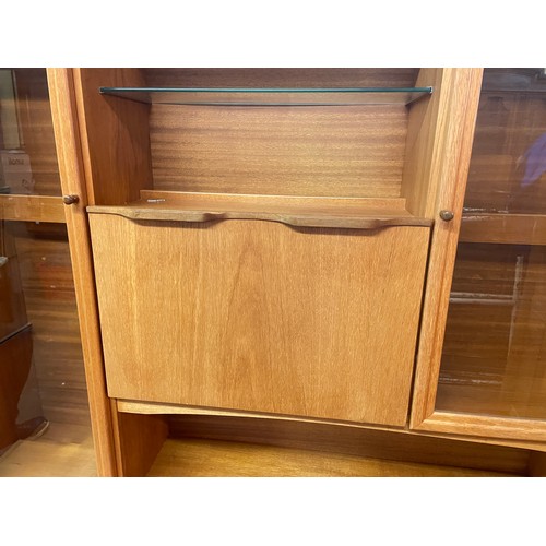 121 - SAKOL TEAK GLAZED LOUNGE UNIT AND ONE SIMILAR UNIT