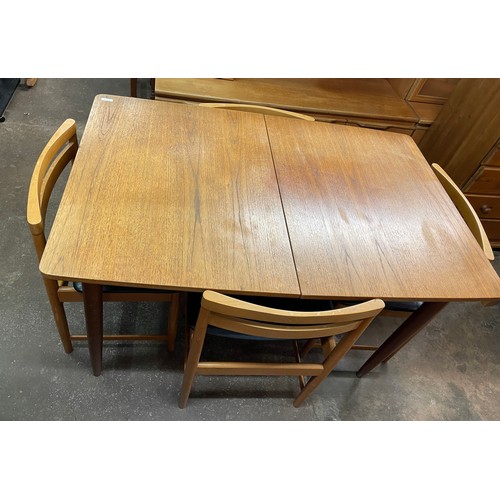 146 - TEAK EXTENDING DINING TABLE AND SIX BEECH LADDER BACK DINING CHAIRS