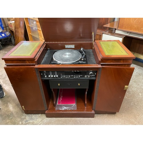 92 - GARRAD MUSIC CENTRE IN A REGENCY STYLE BREAKFRONT AND LEATHER TOPPED SIDE CABINET