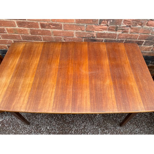 145 - 1960S TEAK OBLONG EXTENDING DINING TABLE