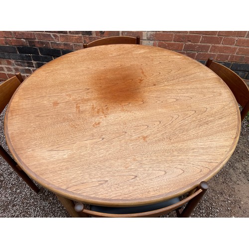 149 - 1960S G PLAN TEAK CIRCULAR TABLE AND FOUR CHAIRS