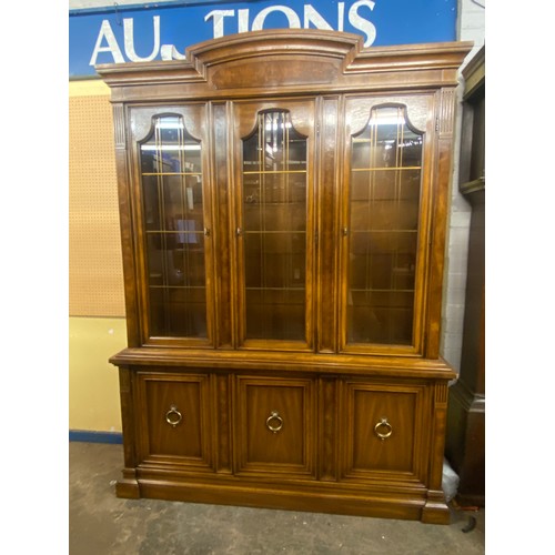 156 - COLONIAL WALNUT GLAZED THREE DOOR VITRINE