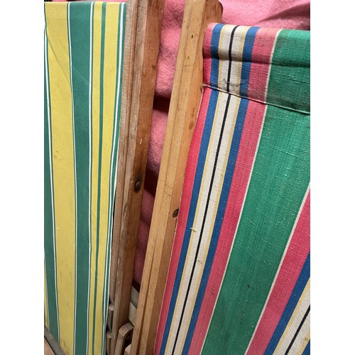 36 - TWO CANDY STRIPED FOLDING DECK CHAIRS