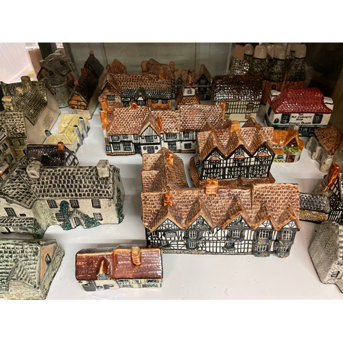 440 - TWO SHELVES OF MAINLY TEY POTTERY COTTAGES, CROFTS, AND BUILDINGS