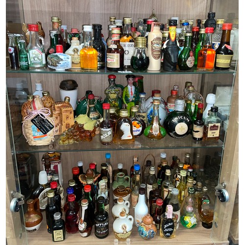 415 - THREE SHELVES OF NOVELTY SPIRIT MINIATURES