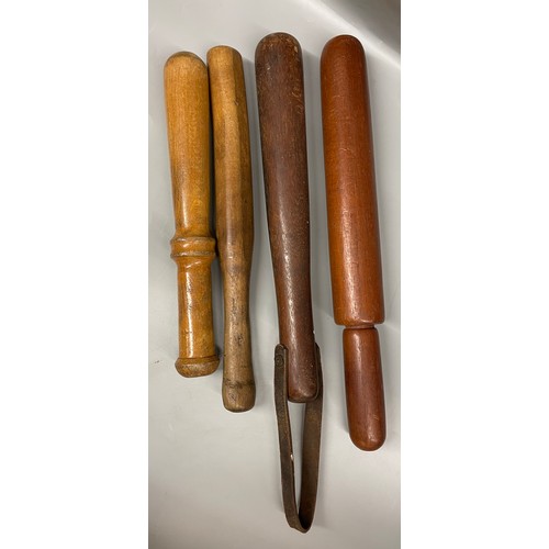 315 - FOUR CARVED TURNED WOODEN TRUNCHEONS