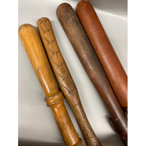 315 - FOUR CARVED TURNED WOODEN TRUNCHEONS