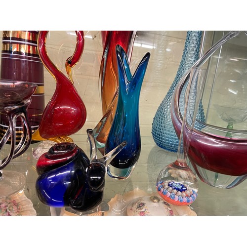 357 - SHELF OF 20TH CENTURY COLOURED GLASSWARE INC SPILL VASES, WHITE FRIARS, BUD VASE, GENIE BOTTLE, JELL... 