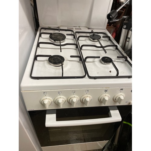 73 - FOUR BURNER GAS COOKER