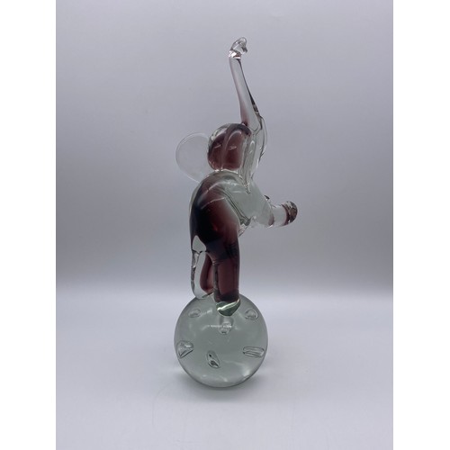 513 - HEAVY GLASS BALANCING ELEPHANT ON BUBBLE PAPER WEIGHT