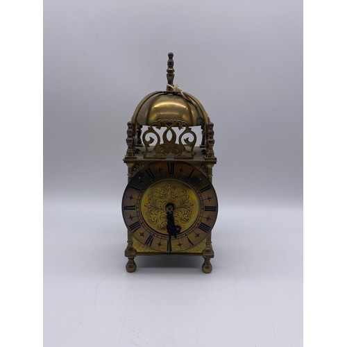 515 - REPRODUCTION BRASS LANTERN CLOCK WITH KEY