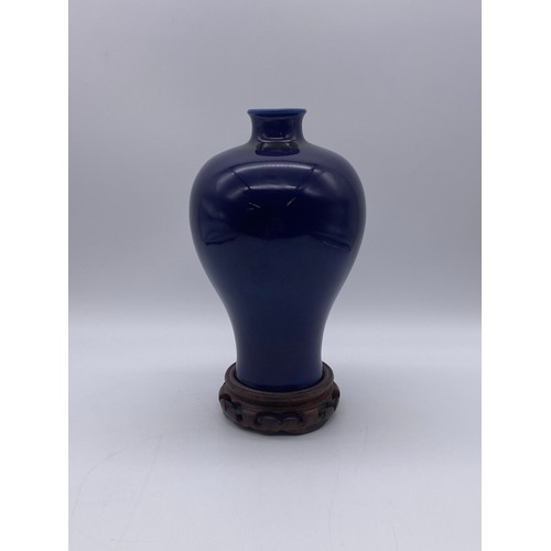 523 - CHINESE MONOCHROME PLUM GLAZE MEIPING VASE ON HARDWOOD STAND